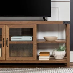 Sophie Rustic Farmhouse X Frame Glass Doors TV Stand For TVs Up To 80" Rustic Oak - Saracina Home 22 Sophie Rustic Farmhouse X Frame Glass Doors TV Stand For TVs Up To 80" Rustic Oak - Saracina Home -Saracina Home Shop GUEST 08461d43 c3a2 4df9 90e5 c2fd20627359
