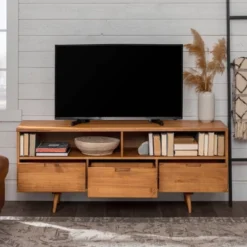 Cara Mid-Century Modern 3 Drawer TV Stand For TVs Up To 65" - Saracina Home 31 Cara Mid-Century Modern 3 Drawer TV Stand For TVs Up To 65" - Saracina Home -Saracina Home Shop GUEST 6406604d 1ec4 4548 a085 d7d44d4bfcce