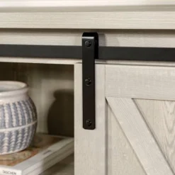 Modern Transitional Sliding Barndoor TV Stand For TVs Up To 65"- Saracina Home 24 Modern Transitional Sliding Barndoor TV Stand For TVs Up To 65"- Saracina Home -Saracina Home Shop GUEST 964d1916 022a 4e1e 9775 20ffa11829ba